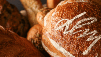 Loaf of bread with "DLM" written on it to represent Dorothy Lane Market.