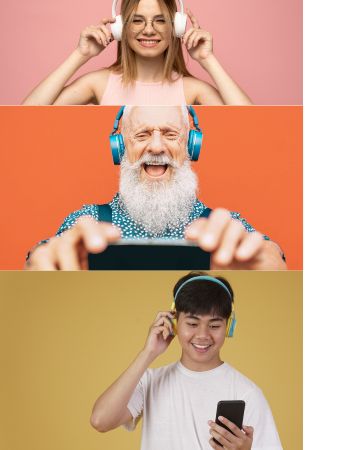 Three people with headphones listening to Freegal Music - free with thier library card.