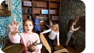 Children seeks clues in an escape room