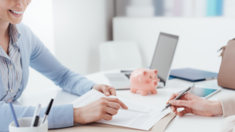 Two women working on financial planning