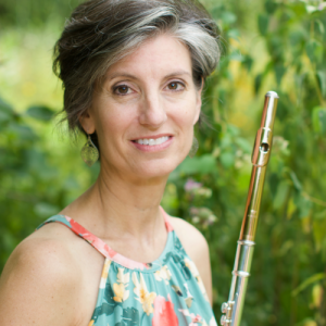 headshot of Gretchen Germann holding a flute