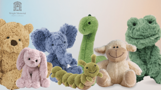 stuffed animals sitting in a row against a pastel background