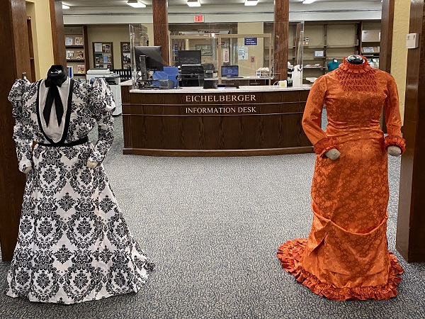 Dresses on exhibit at Wright Library