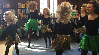 Young Irish Dancers performing in the library