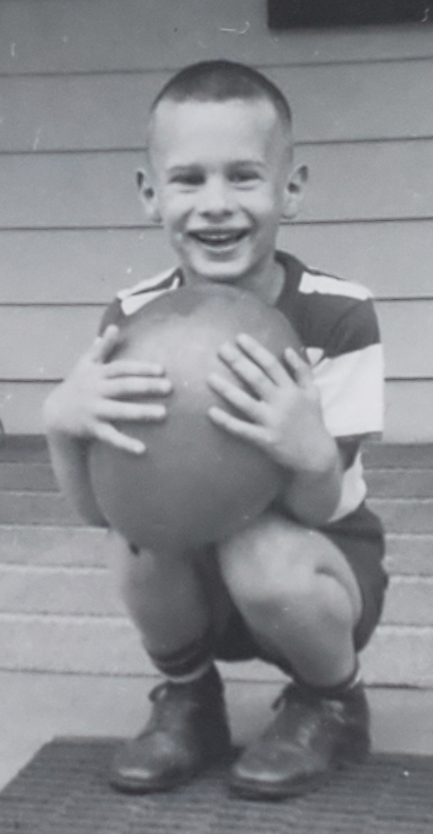 Fory as a boy on the steps of his childhood home on Claranna in Oakwood