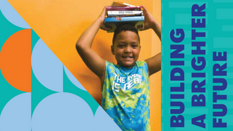 Summer reading club boy happily holds his prize books Text: building a brighter future